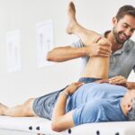 Thats good. Cropped shot of a young male physiotherapist assisting a senior patient in recovery.